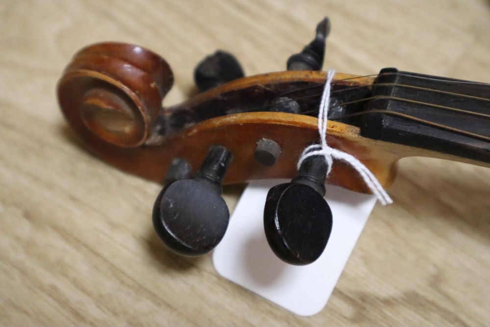 A Czech 3/4 size violin and a German 3/4 size violin, length of backs both 34cm